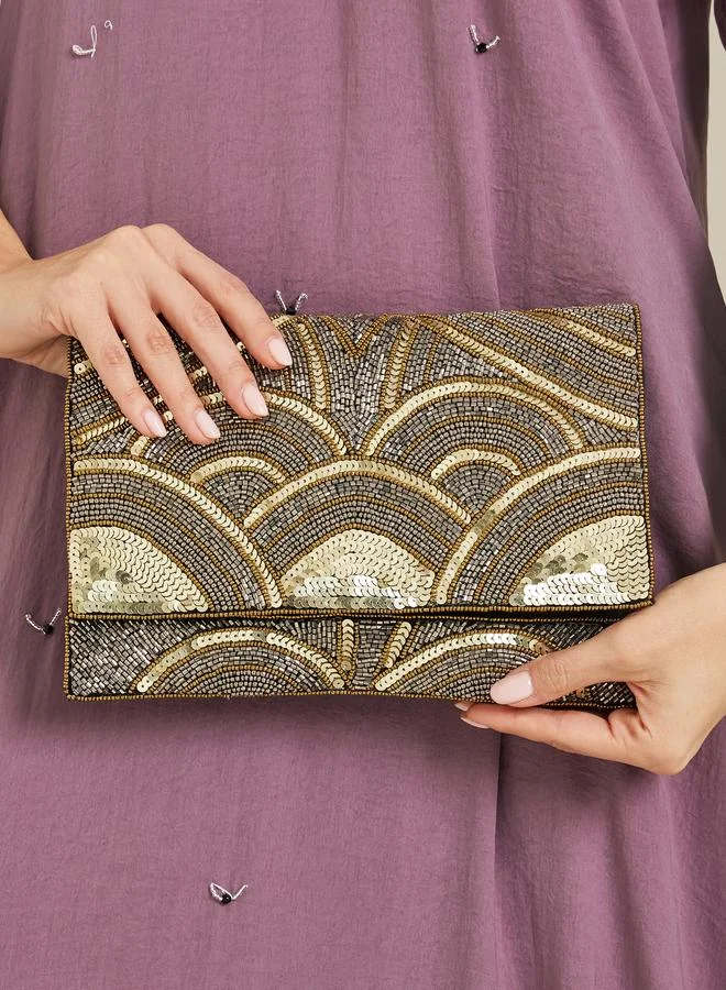 ستايلي حقيبة كلاتش ذهبية بالترتر